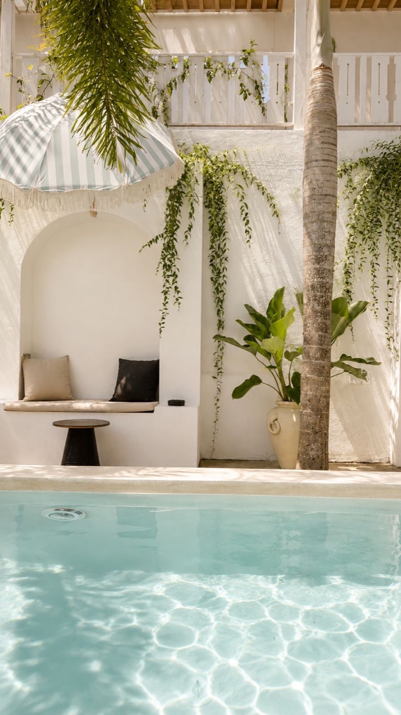 Poolside cabana seating at the boutique hotel